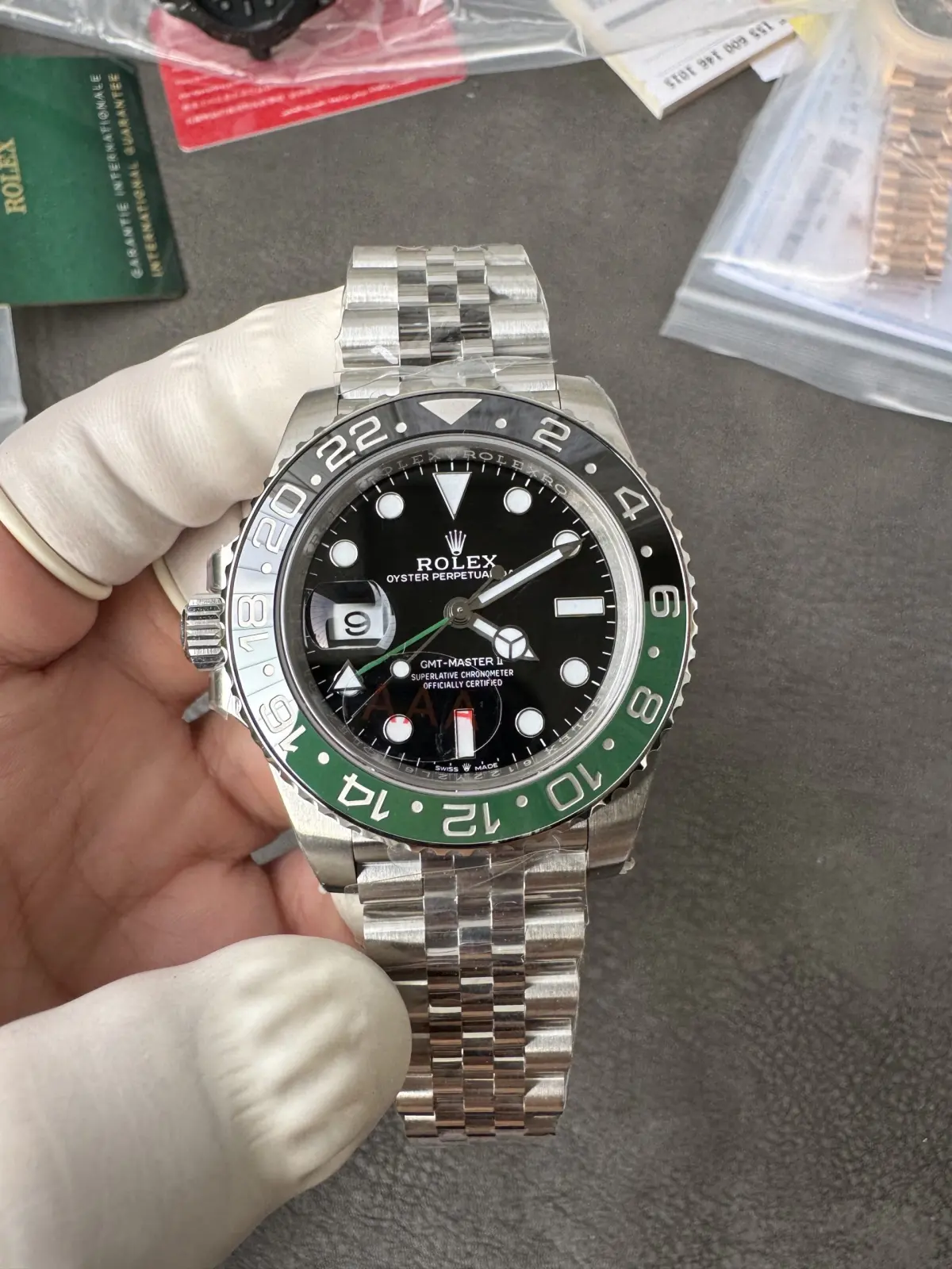 Gloved pre-shipment visual inspection of a VS Factory GMT watch