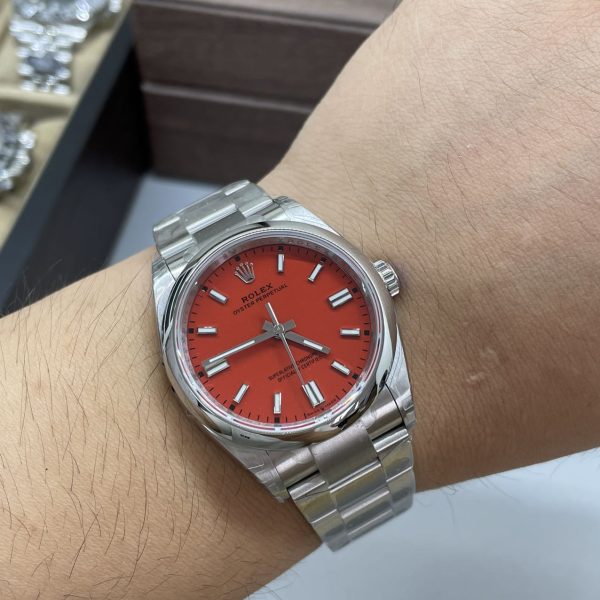 VS Factory Rolex Oyster Perpetual 36mm Coral Red Dial Smooth Bezel Oyster Bracelet (126000) — detail view 9