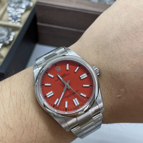 VS Factory Rolex Oyster Perpetual 41mm Coral Red Dial Smooth Bezel Oyster Bracelet (124300) — detail view 6